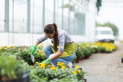 Professional gardeners in Elmstead working on seasonal planting
